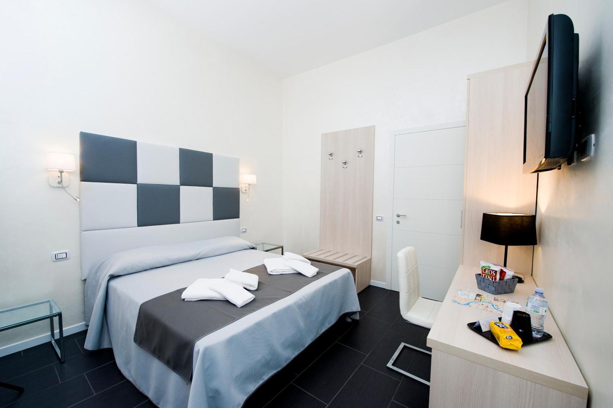 Grey&White Hotell Rom Rum bild