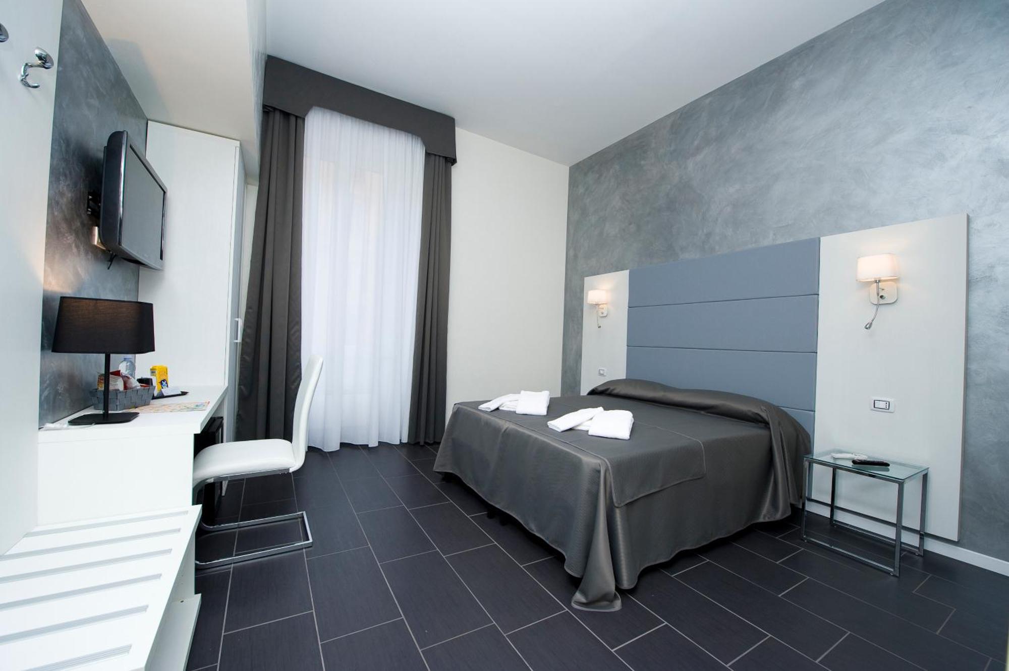 Grey&White Hotell Rom Rum bild